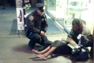 new-york-police-officer-homeless-man-boots-photo